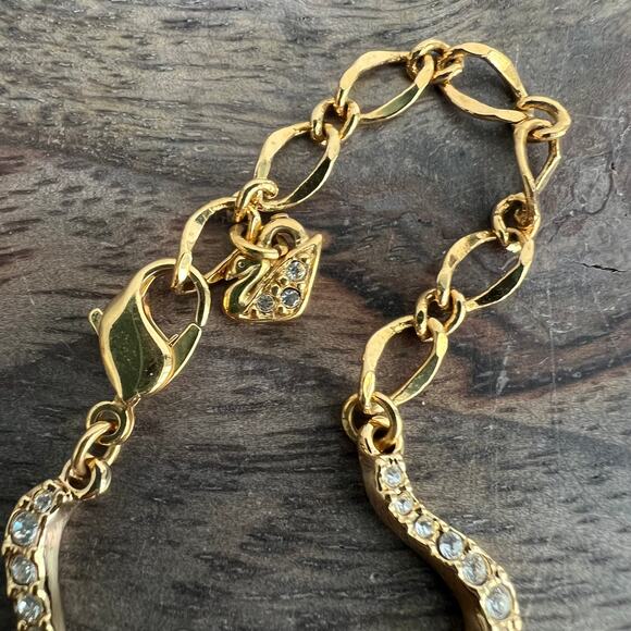 Signed Swarovski Crystal Elegant Gold Tone Wave Necklace missing one small stone - Picture 6 of 7
